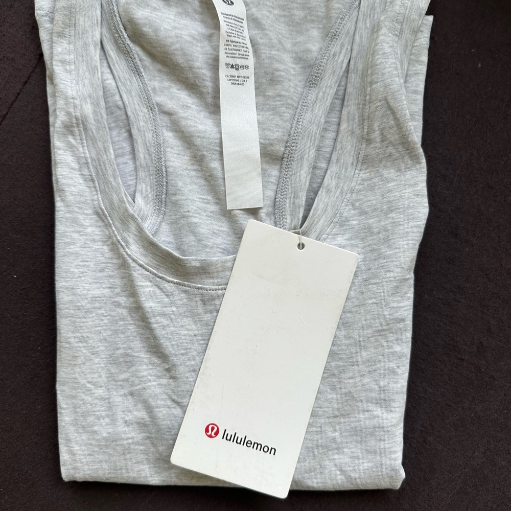 Lululemon Athletica Asymmetrical Gray Sleeveless Tank Top - Picture 2 of 9